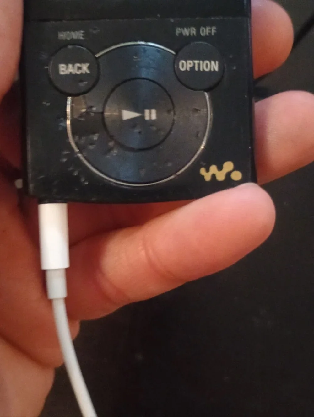 Sony Black Portable MP3 Player with White Earbuds and USB Cable